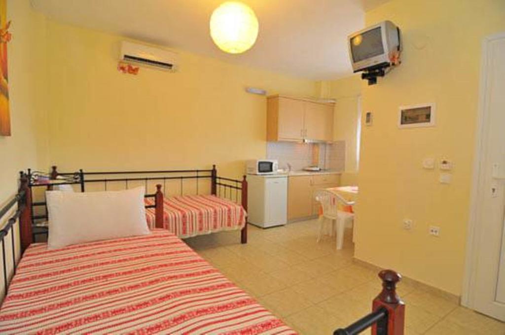 Nestor Apartments Chrisi Ammoudia Rum bild